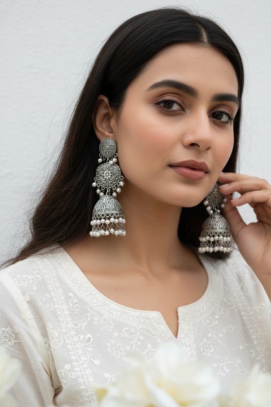 Yashvini German Silver Jhumka Earrings Online | Oxidised Pearl Jhumkas for Women