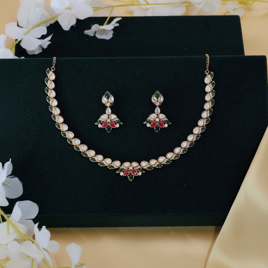 Polki Necklace Set with Emerald and Ruby Stones Elegant Jewellery India