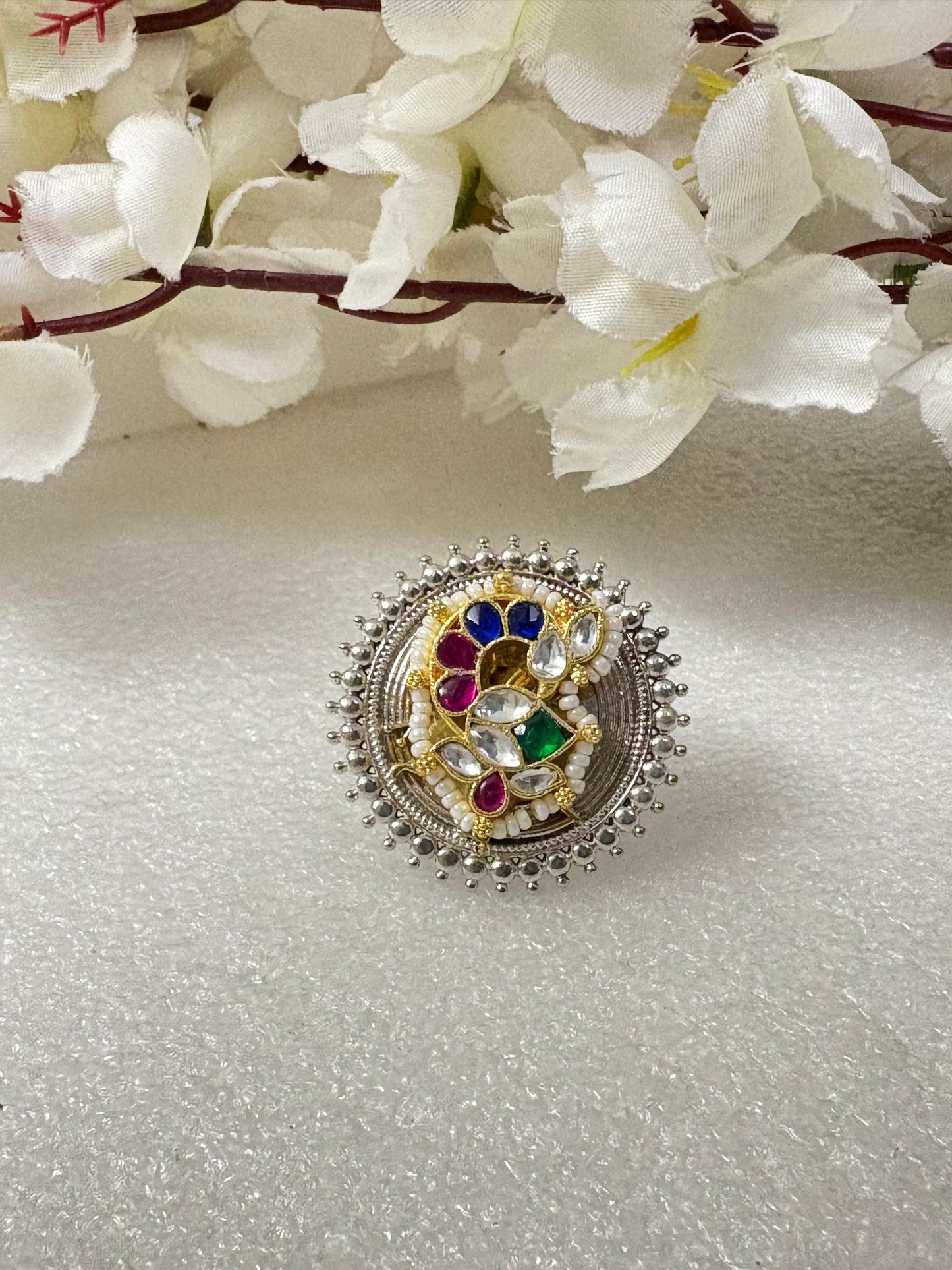 Mayurang Dual Tone Navratna Kundan Ring

Handcrafted Adjustable Statement Ring | Antique Silver & Gold Kundan Cocktail Ring | Heritage Fusion Jewellery