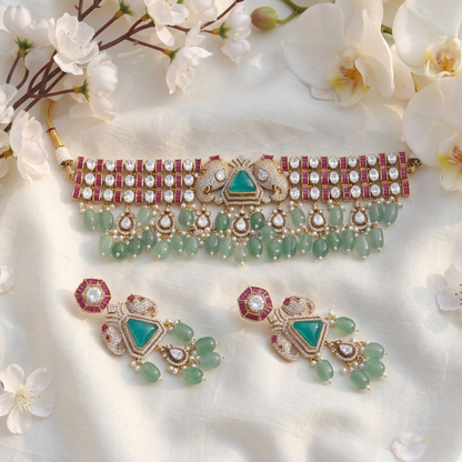 Jewelry set with necklace and earrings on a floral background