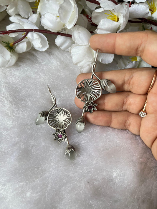 Lotus Bloom Silver Drop Earrings – Elegant Oxidised Floral Design with Stone Detailing