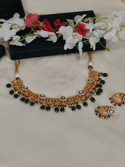 Mehera Gold Lookalike Jadtar Kundan Necklace Set with Green Bead Drops & Jhumka Earrings | Traditional Bridal Jewellery