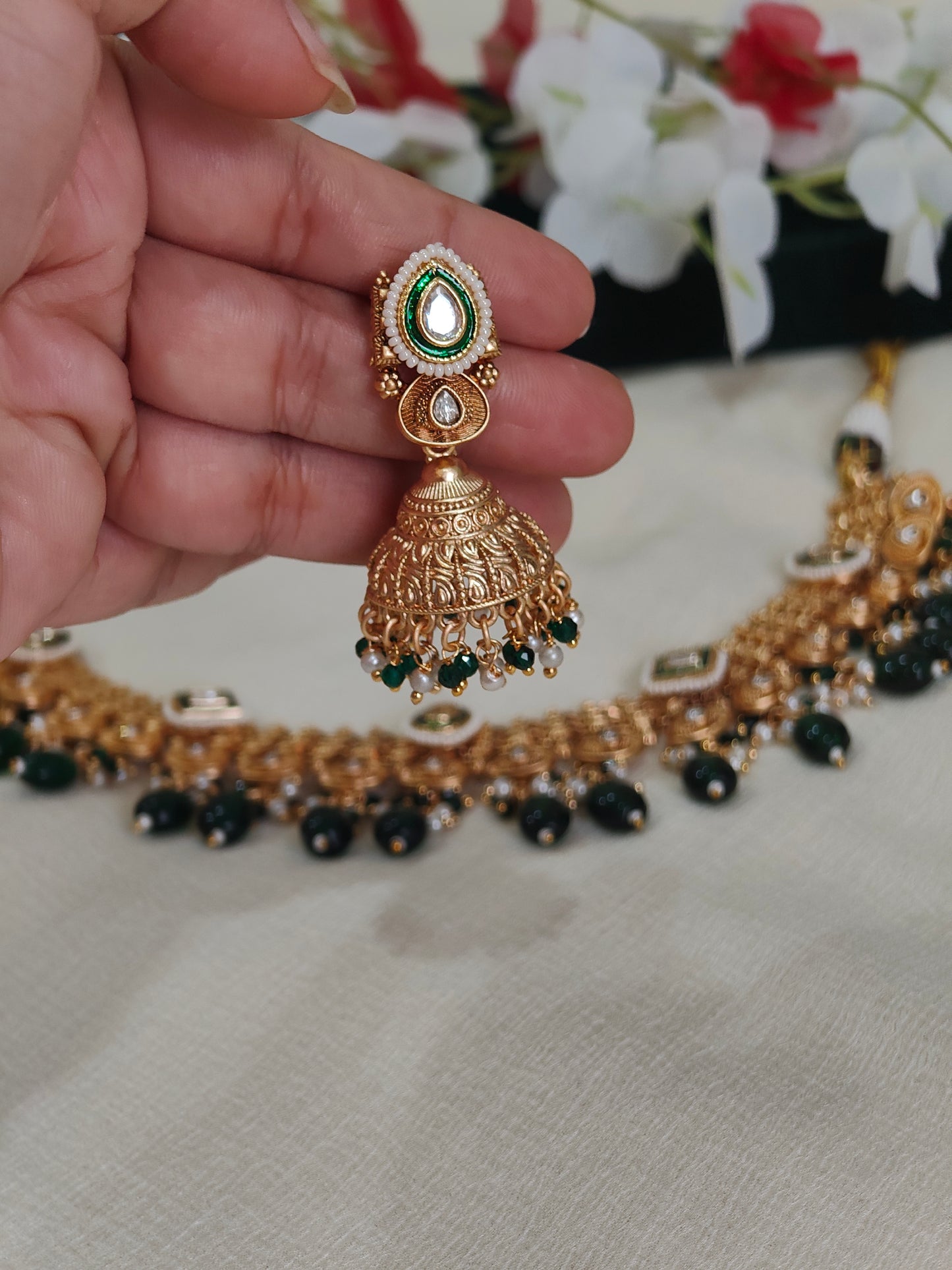 Mehera Gold Lookalike Jadtar Kundan Necklace Set with Green Bead Drops & Jhumka Earrings | Traditional Bridal Jewellery