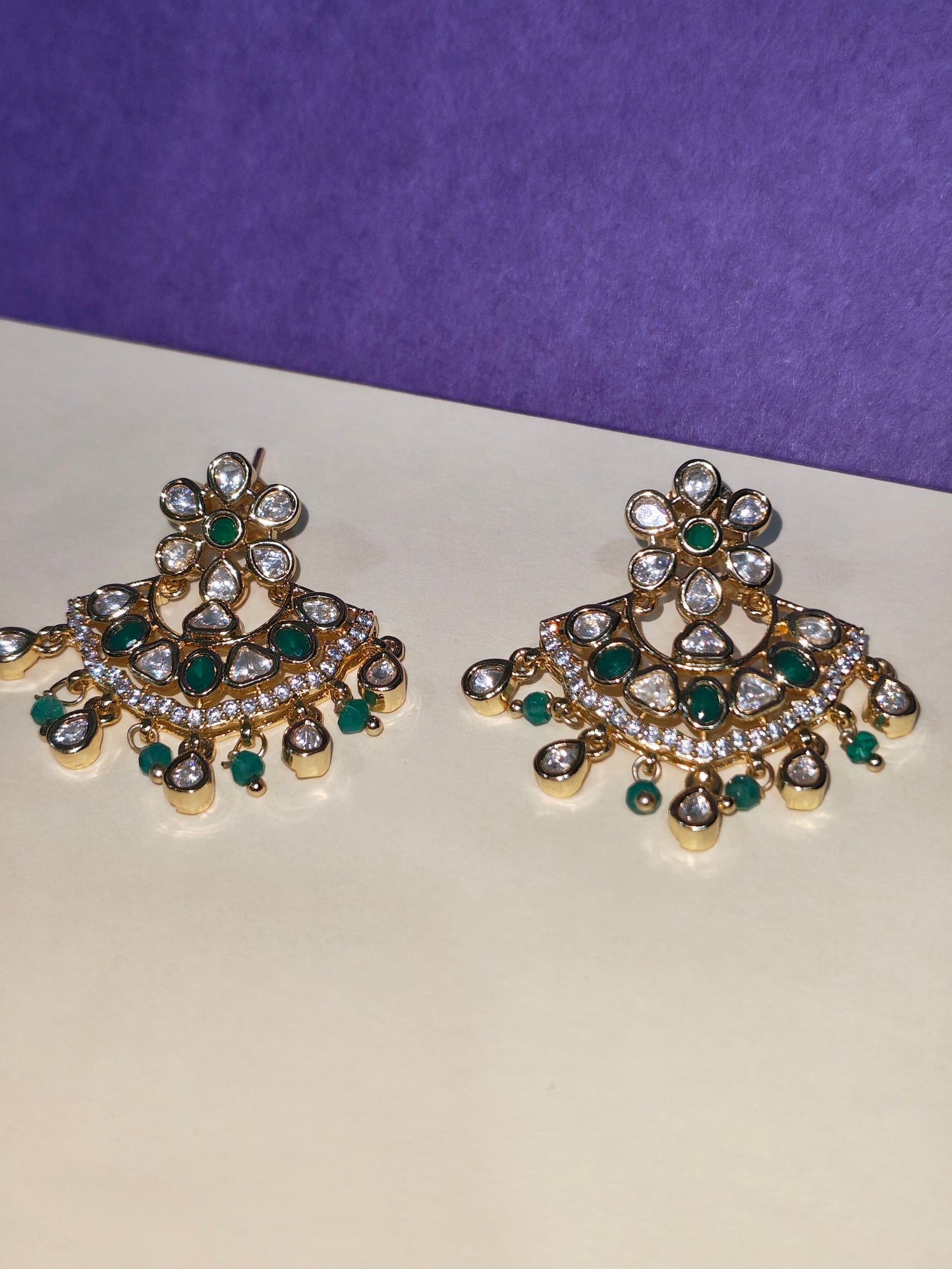 Premium Moissanite Polki Chandbali Earrings with Emerald Green Stones | Alankrent - Alankrent Luxe