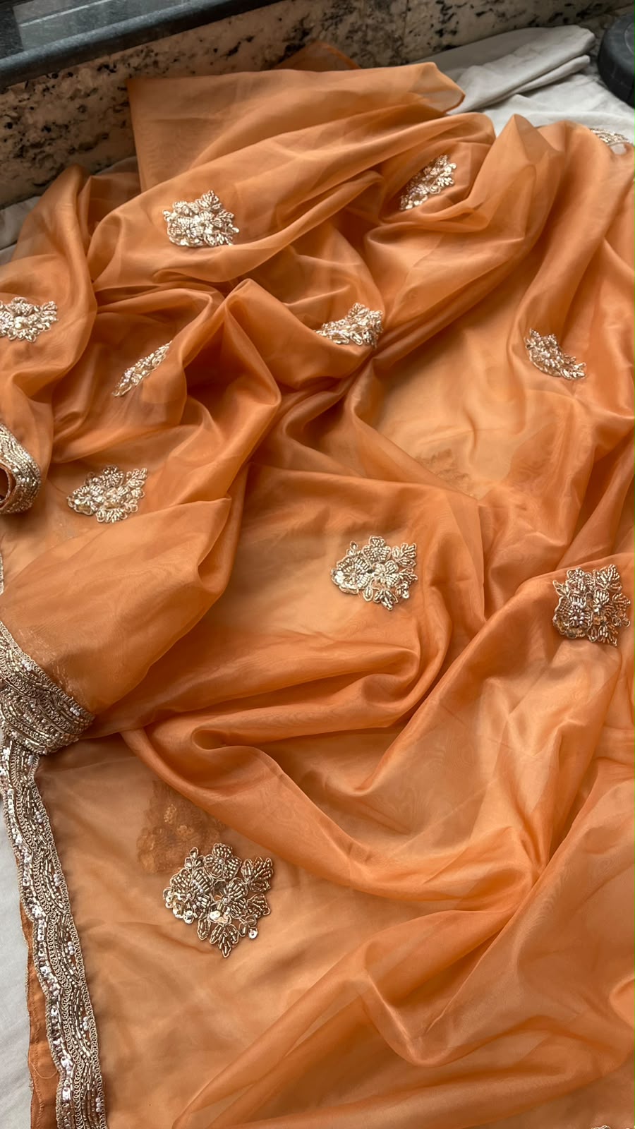 Aarohi Sunehri Tissue Saree | Peach Orange Tissue Saree with Pearl, Sequins & Coding Work and Contrast Silk Blouse