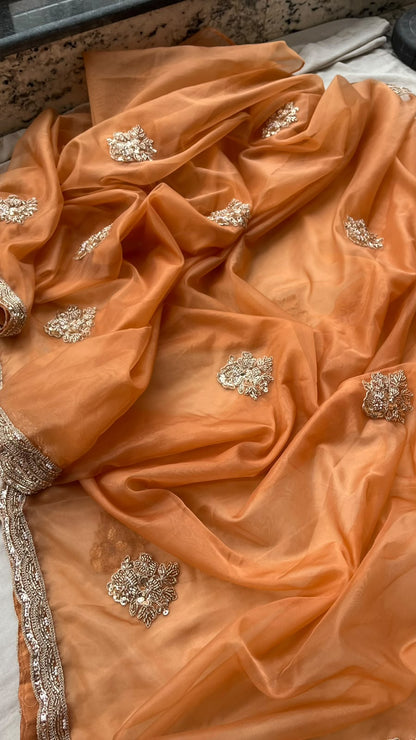 Aarohi Sunehri Tissue Saree | Peach Orange Tissue Saree with Pearl, Sequins & Coding Work and Contrast Silk Blouse