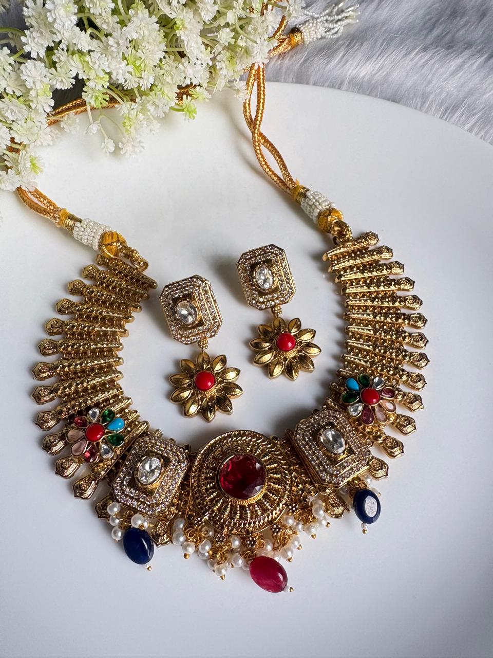 Aaradhya Matt Gold Apala Polish Necklace Set with Multicolor Stones & Earrings